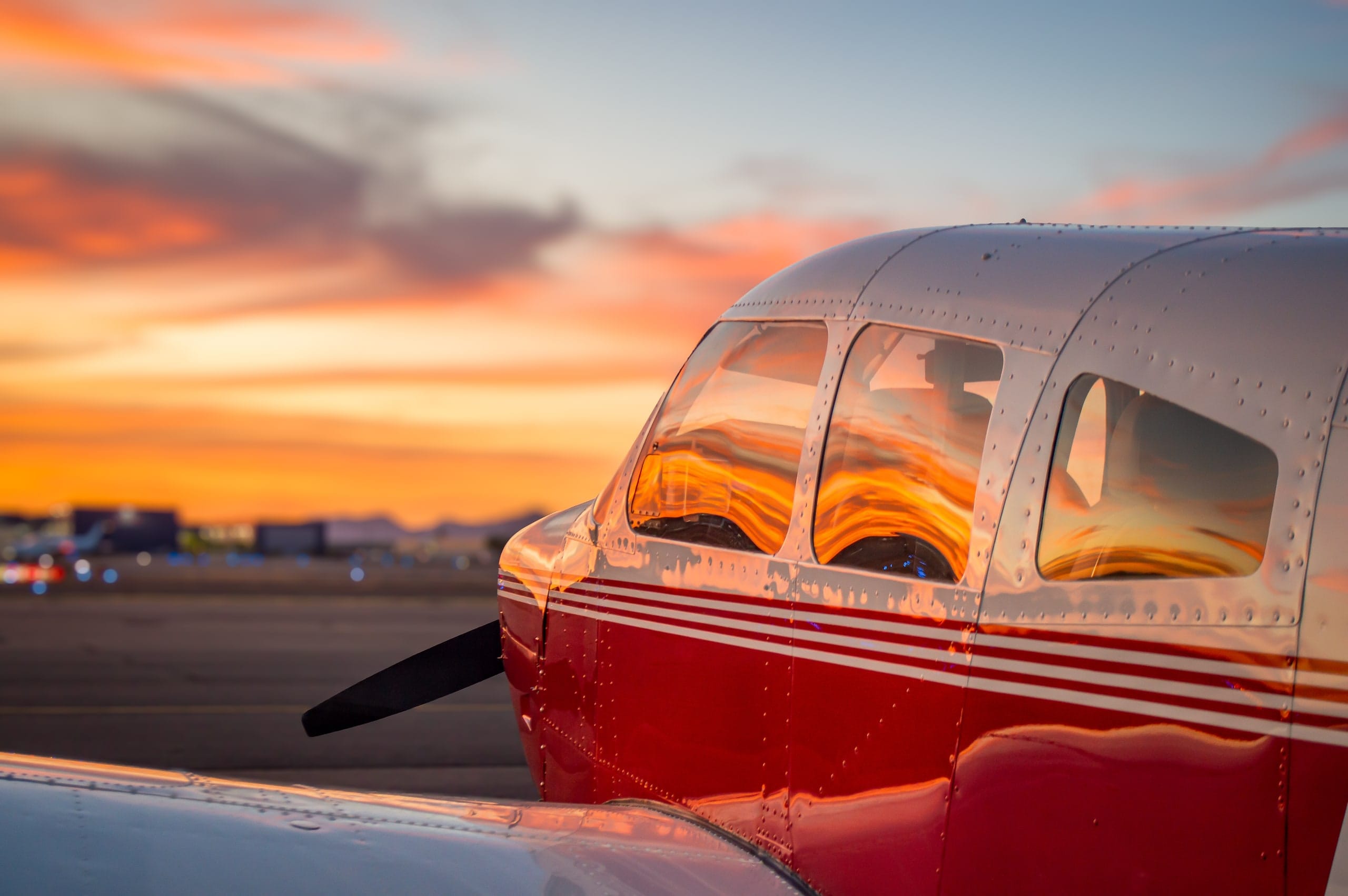A Desert Wings Archer II at sunset on the Falcon Field ramp.